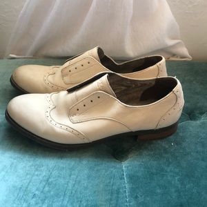 Cream colored Sperry loafers